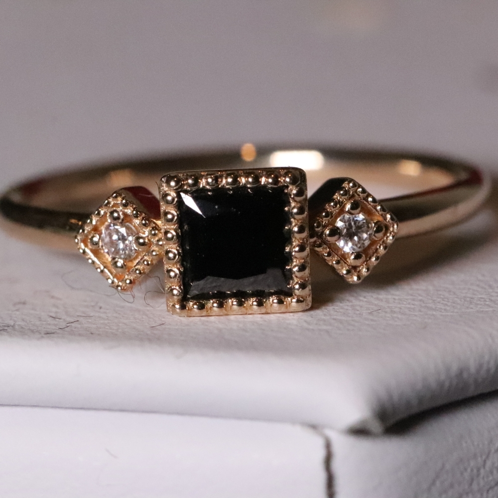 14k black moissanite and side diamond ring